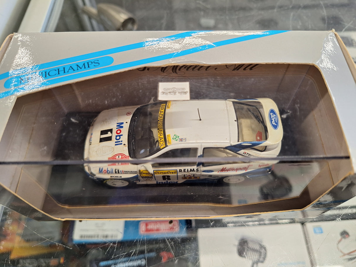 "Pre owned" Minichamps 1:43 1994 Ford Escort Cosworth Rallye Monet Carlo Winner